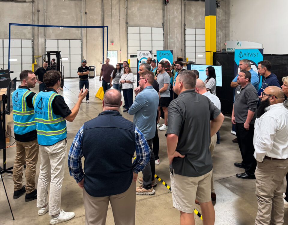 Arvist Experience Center hands-on demo showing AI warehouse quality control stations in action